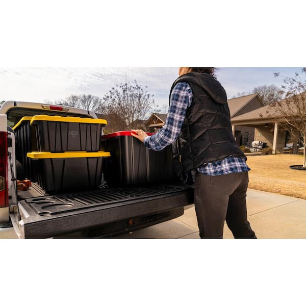 Loading moving totes into a pickup truck
