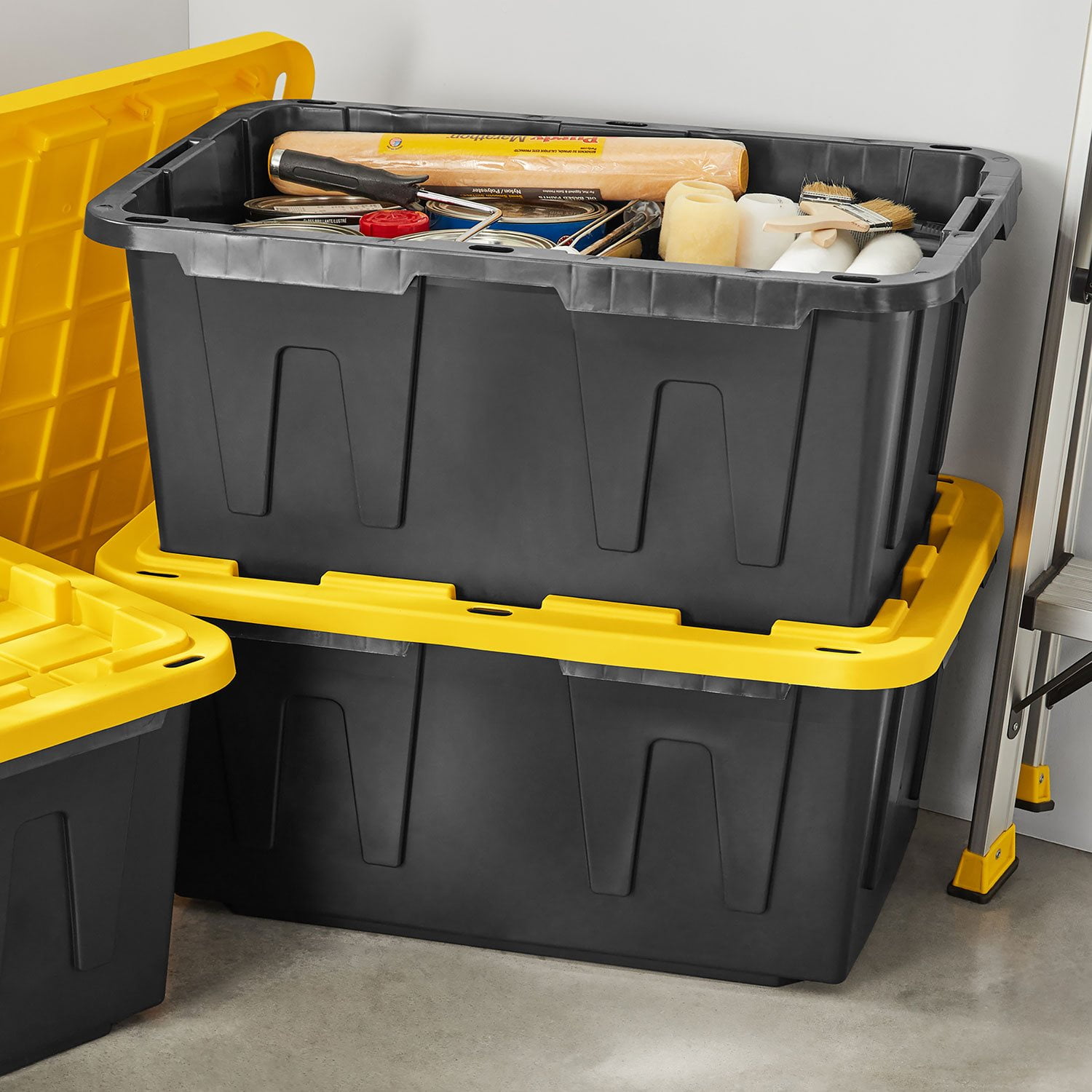 Moving totes packed with household supplies